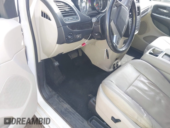 2012 Chrysler Town & Country Touring L with VIN 2C4RC1CG7CR156415, listed as a IAAI auction lot 42045371 with 233,306 mi miles and . Bid and sale history available at carsss.com. Image 16.