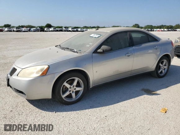 2008 Pontiac G6 z VIN 1G2ZG57N184198212, wystawiony jako Copart lot #70977674 z przebiegiem 118 154 mil mil oraz Czysty tytuł • Clean title. Historia ofert i sprzedaży dostępna na DreamBid. Obrazek 1.