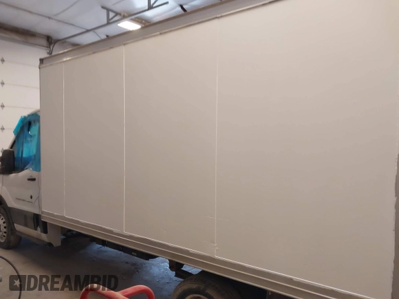 2019 Ford Transit with VIN 1FDBF8ZM1KKA86059, listed as a IAAI auction lot 42434134 with 82,668 mi miles and . Bid and sale history available at DreamBid. Image 14.