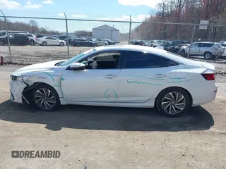 2021 Honda Insight Touring with VIN 19XZE4F95ME000787, listed as a IAAI auction lot 41888840 with 82,173 mi miles and . Bid and sale history available at carsss.com. Image 14.