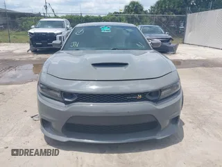2019 Dodge Charger Scat Pack with VIN 2C3CDXGJ2KH633854, listed as a IAAI auction lot 42212517 with 74,285 mi miles and . Bid and sale history available at DreamBid. Image 12.