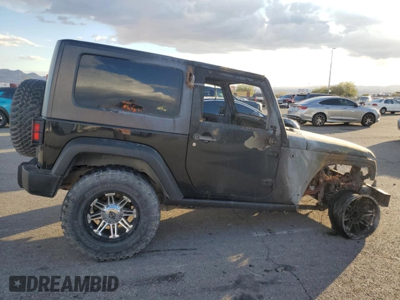 2009 Jeep Wrangler Rubicon with VIN 1J4GA64119L762714, listed as a Copart auction lot 80943364 with Not Provided miles and Salvage Title. Bid and sale history available at DreamBid. Image 3.