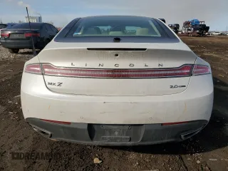 2014 Lincoln MKZ с VIN 3LN6L2G99ER831310, выставлен на аукционе Copart как лот 48577655 с пробегом 172 148 миль миль и Списание • Salvage title. История ставок и продаж доступна на DreamBid. Изображение 6.
