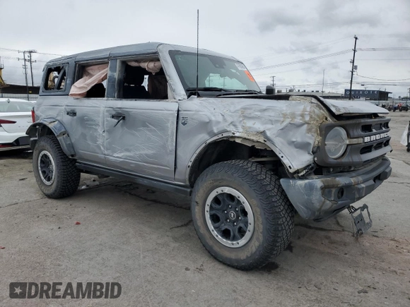 2022 Ford Bronco with VIN 1FMEE5DP1NLA98307, listed as a Copart auction lot 47690365 with 34,490 mi miles and Salvage Title. Bid and sale history available at DreamBid. Image 4.