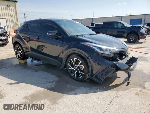 2020 Toyota C-HR LE z VIN JTNKHMBX9L1077558, wystawiony jako Copart lot #53603615 z przebiegiem 61 254 mil mil oraz Szkoda całkowita • Salvage title. Historia ofert i sprzedaży dostępna na DreamBid. Obrazek 4.