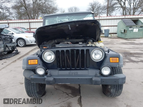 2004 Jeep Wrangler Sport with VIN 1J4FA49S64P794559, listed as a IAAI auction lot 41644201 with 107,445 mi miles. Bid and sale history available at carsss.com. Image 6.