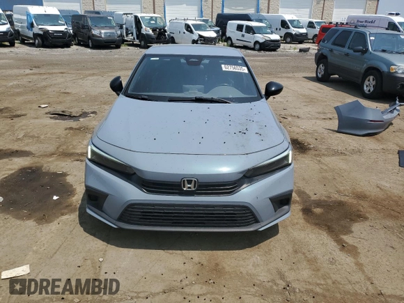 2023 Honda Civic Sport with VIN 2HGFE2F51PH510620, listed as a Copart auction lot 62756535 with 59,625 mi miles and Salvage title. Bid and sale history available at DreamBid. Image 5.