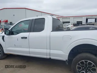 2023 Ford F-150 XL with VIN 1FTEX1CP9PKD57496, listed as a IAAI auction lot 40744859 with 56,487 mi miles and . Bid and sale history available at DreamBid. Image 14.