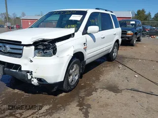 2007 Honda Pilot EX-L with VIN 2HKYF185X7H515012, listed as a IAAI auction lot 41914750 with 231,177 mi miles. Bid and sale history available at carsss.com. Image 6.