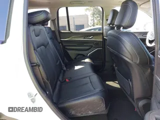2022 Jeep Grand Cherokee with VIN 1C4RJYB66N8718018, listed as a IAAI auction lot 42002051 with Not provided miles and . Bid and sale history available at DreamBid. Image 8.