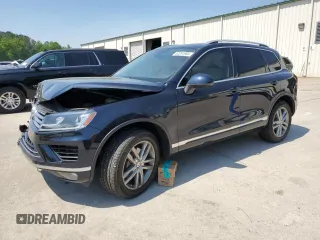 2015 Volkswagen Touareg Lux с VIN WVGEP9BP2FD006802, выставлен на аукционе Copart как лот 52291965 с пробегом 122 787 миль миль и Списание • Salvage title. История ставок и продаж доступна на DreamBid. Изображение 1.