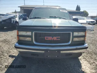 1996 GMC Yukon with VIN 1GKEK13R3TJ750284, listed as a Copart auction lot 69022244 with 266,366 mi miles and Salvage Title. Bid and sale history available at carsss.com. Image 5.
