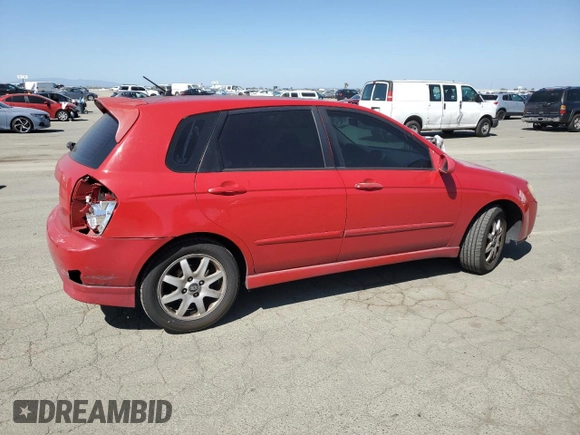 2005 Kia Spectra with VIN KNAFE162455069422, listed as a Copart auction lot 52999455 with 249,774 mi miles and Salvage Title. Bid and sale history available at carsss.com. Image 3.