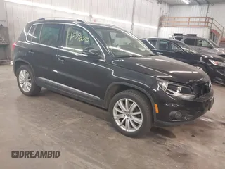 2013 Volkswagen Tiguan SE with VIN WVGBV7AXXDW509168, listed as a IAAI auction lot 42396042 with 103,446 mi miles and . Bid and sale history available at DreamBid. Image 1.