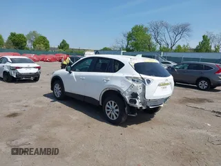 2013 Mazda CX-5 Touring with VIN JM3KE4CE1D0136241, listed as a IAAI auction lot 42119260 with 106,913 mi miles and . Bid and sale history available at carsss.com. Image 3.