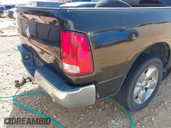 2014 Ram 1500 Big Horn with VIN 1C6RR6LT7ES229297, listed as a IAAI auction lot 42387218 with 99,811 mi miles and . Bid and sale history available at DreamBid. Image 18.