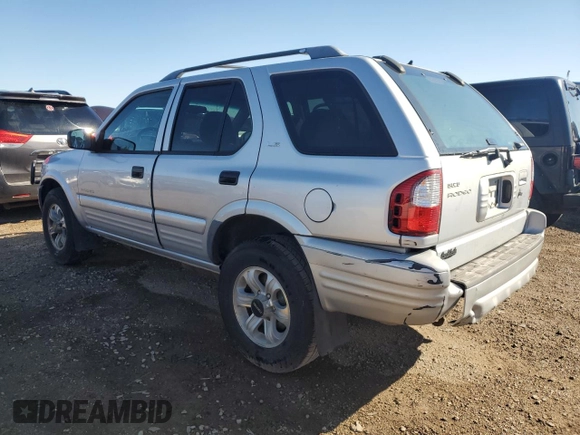 2001 Isuzu Rodeo S with VIN 4S2CK58W914301037, listed as a Copart auction lot 72153074 with 230,781 mi miles and Clean Title. Bid and sale history available at DreamBid. Image 2.
