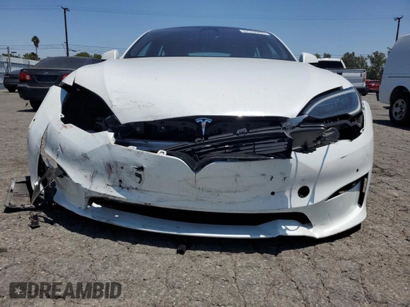 2023 Tesla Model S z VIN 5YJSA1E58PF500032, wystawiony jako Copart lot #57532955 z przebiegiem Nie podano mil oraz Szkoda całkowita • Salvage title. Historia ofert i sprzedaży dostępna na DreamBid. Obrazek 5.