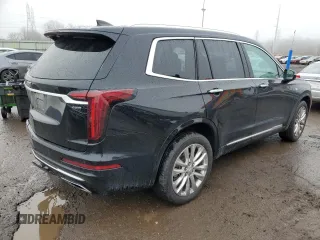 2021 Cadillac XT6 Premium Luxury z VIN 1GYKPDRS8MZ103159, wystawiony jako Copart lot #73400792 z przebiegiem 54 365 mil mil oraz . Historia ofert i sprzedaży dostępna na DreamBid. Obrazek 3.