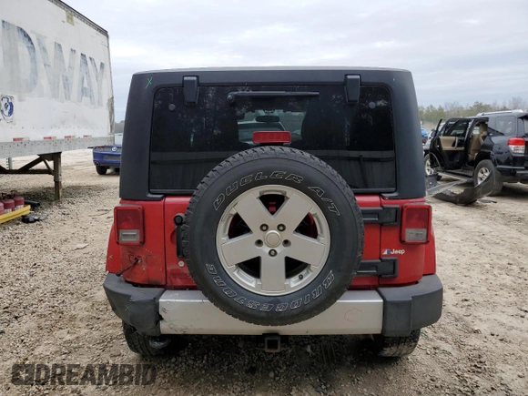 2012 Jeep Wrangler Arctic z VIN 1C4AJWBG9CL123832, wystawiony jako Copart lot #87376204 z przebiegiem 174 097 mil mil oraz Szkoda całkowita • Salvage title. Historia ofert i sprzedaży dostępna na DreamBid. Obrazek 6.