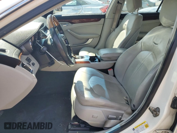 2010 Cadillac CTS Luxury with VIN 1G6DE5EG9A0132751, listed as a Copart auction lot 69049134 with 128,857 mi miles and Salvage Title. Bid and sale history available at carsss.com. Image 7.