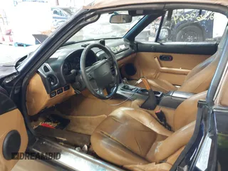 1996 Mazda MX-5 Miata z VIN JM1NA3534T0708649, wystawiony jako IAAI lot #42369564 z przebiegiem 202 690 mil mil oraz . Historia ofert i sprzedaży dostępna na DreamBid. Obrazek 5.