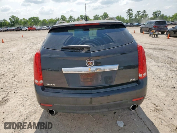 2012 Cadillac SRX Premium Collection z VIN 3GYFNCE39CS526425, wystawiony jako Copart lot #60557615 z przebiegiem 161 217 mil mil oraz Szkoda całkowita • Salvage title. Historia ofert i sprzedaży dostępna na DreamBid. Obrazek 6.