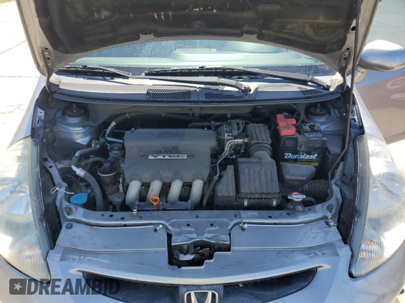 2008 Honda Fit z VIN JHMGD38498S053208, wystawiony jako Copart lot #51540825 z przebiegiem 174 509 mil mil oraz Szkoda całkowita • Salvage title. Historia ofert i sprzedaży dostępna na DreamBid. Obrazek 13.