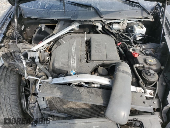 2012 BMW X5 35i with VIN 5UXZV4C5XCL761370, listed as a Copart auction lot 59436845 with 124,722 mi miles and Salvage title. Bid and sale history available at DreamBid. Image 12.