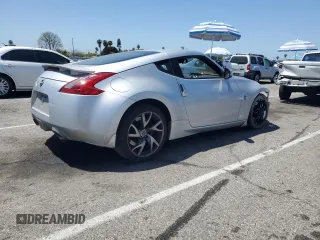 2014 Nissan 370Z Nismo with VIN JN1AZ4EH8EM633218, listed as a Copart auction lot 57296165 with Not provided miles and Salvage title. Bid and sale history available at DreamBid. Image 3.