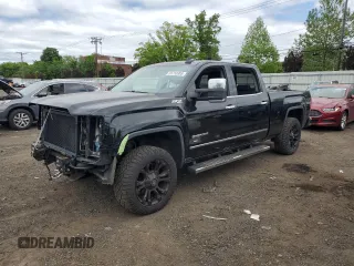 2017 GMC Sierra 1500 SLT z VIN 3GTU2NEC3HG484863, wystawiony jako Copart lot #55753905 z przebiegiem 126 674 mil mil oraz Szkody całkowita. Historia ofert i sprzedaży dostępna na DreamBid. Obrazek 1.