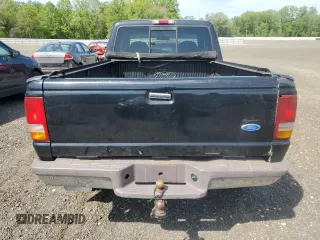 1997 Ford Ranger XLT with VIN 1FTDR15X9VTA24287, listed as a Copart auction lot 54923325 with 148,921 mi miles and Salvage Title. Bid and sale history available at DreamBid. Image 6.
