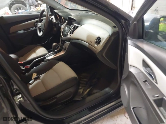 2016 Chevrolet Cruze Limited LS with VIN 1G1PC5SH9G7203386, listed as a IAAI auction lot 41952726 with 79,612 mi miles. Bid and sale history available at carsss.com. Image 5.