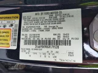 2016 Ford Fusion Titanium with VIN 3FA6P0K90GR179528, listed as a IAAI auction lot 42181213 with 230,264 mi miles. Bid and sale history available at carsss.com. Image 9.