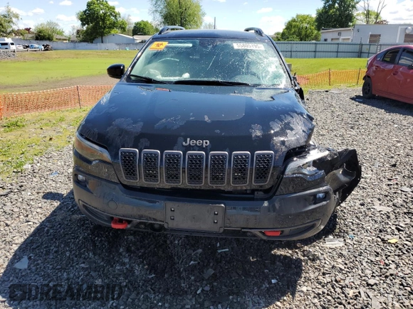 2022 Jeep Cherokee Trailhawk with VIN 1C4PJMBX8ND543366, listed as a Copart auction lot 55805195 with 61,926 mi miles and Salvage title. Bid and sale history available at DreamBid. Image 5.