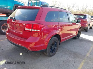 2019 Dodge Journey SE with VIN 3C4PDCBB6KT857285, listed as a IAAI auction lot 41918380 with 115,120 mi miles and . Bid and sale history available at DreamBid. Image 4.