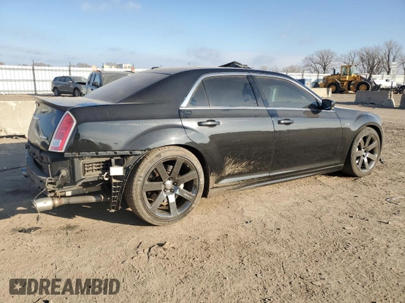 2013 Chrysler 300 SRT-8 with VIN 2C3CCAFJ8DH646483, listed as a Copart auction lot 83261144 with 86,015 mi miles and Salvage Title. Bid and sale history available at DreamBid. Image 3.