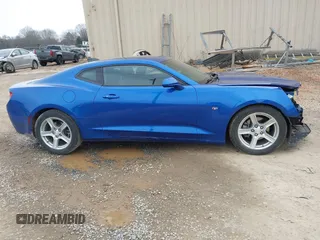 2017 Chevrolet Camaro 1LT z VIN 1G1FB1RX1H0144817, wystawiony jako IAAI lot #41609587 z przebiegiem 44 477 mil mil oraz . Historia ofert i sprzedaży dostępna na DreamBid. Obrazek 14.