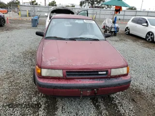 1990 Mazda Protege z VIN JM1BG2246L0167483, wystawiony jako Copart lot #48603295 z przebiegiem 170 461 mil mil oraz Czysty tytuł • Clean title. Historia ofert i sprzedaży dostępna na DreamBid. Obrazek 5.
