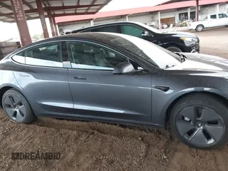 2023 Tesla Model 3 with VIN 5YJ3E1EA6PF655510, listed as a IAAI auction lot 41948480 with 27,179 mi miles and . Bid and sale history available at carsss.com. Image 12.