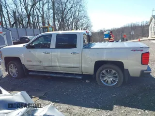 2014 Chevrolet Silverado 1500 High Country with VIN 3GCUKTEJ7EG372338, listed as a IAAI auction lot 41849096 with 69,010 mi miles and . Bid and sale history available at DreamBid. Image 14.