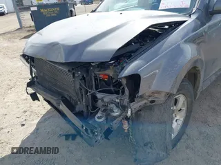 2011 Ford Escape Limited with VIN 1FMCU9EG4BKA57669, listed as a IAAI auction lot 41785314 with 83,970 mi miles. Bid and sale history available at carsss.com. Image 6.
