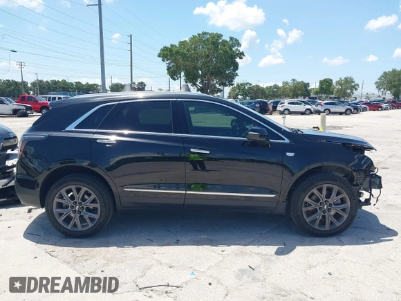 2020 Cadillac XT5 Luxury FWD with VIN 1GYKNAR47LZ239819, listed as a IAAI auction lot 42600145 with 64,311 mi miles and . Bid and sale history available at DreamBid. Image 14.