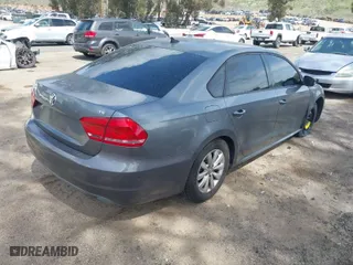 2014 Volkswagen Passat Wolfsburg Ed with VIN 1VWAT7A39EC109525, listed as a IAAI auction lot 41919773 with 133,510 mi miles. Bid and sale history available at carsss.com. Image 4.