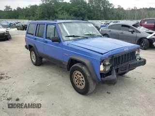 1996 Jeep Cherokee Sport z VIN 1J4FT68S8TL128381, wystawiony jako Copart lot #57496175 z przebiegiem 221 330 mil mil oraz Szkoda całkowita • Salvage title. Historia ofert i sprzedaży dostępna na DreamBid. Obrazek 14.