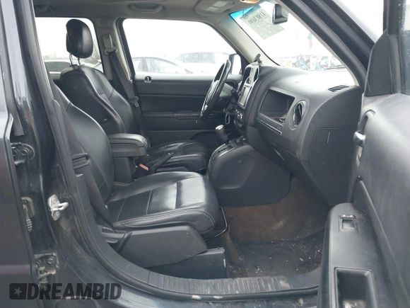 2016 Jeep Patriot Latitude with VIN 1C4NJRFB5GD545467, listed as a IAAI auction lot 41803699 with 172,398 mi miles. Bid and sale history available at carsss.com. Image 5.