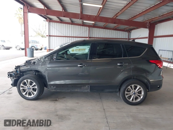 2019 Ford Escape SE with VIN 1FMCU0GD9KUB79835, listed as a IAAI auction lot 42014806 with 130,324 mi miles. Bid and sale history available at carsss.com. Image 15.