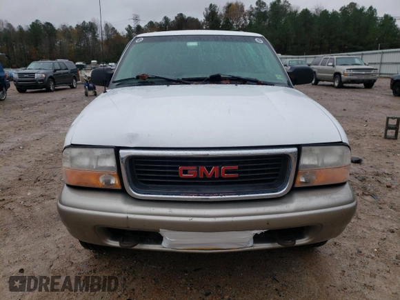 2001 GMC Jimmy SLT with VIN 1GKDT13W712155718, listed as a Copart auction lot 80688554 with 114,116 mi miles and Salvage Title. Bid and sale history available at carsss.com. Image 5.