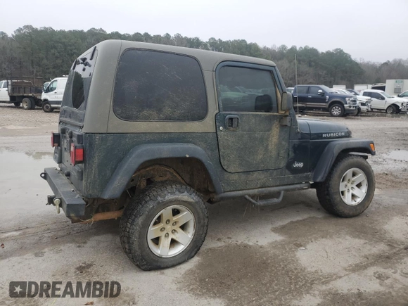 2005 Jeep Wrangler Rubicon with VIN 1J4FA69S95P377014, listed as a Copart auction lot 42676915 with 130,571 mi miles and Salvage Title. Bid and sale history available at carsss.com. Image 3.