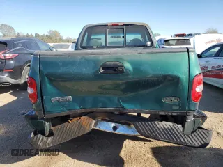 1999 Ford F-150 XL with VIN 2FTZF0720XCA14612, listed as a Copart auction lot 75092304 with 230,897 mi miles and Salvage Title. Bid and sale history available at carsss.com. Image 6.